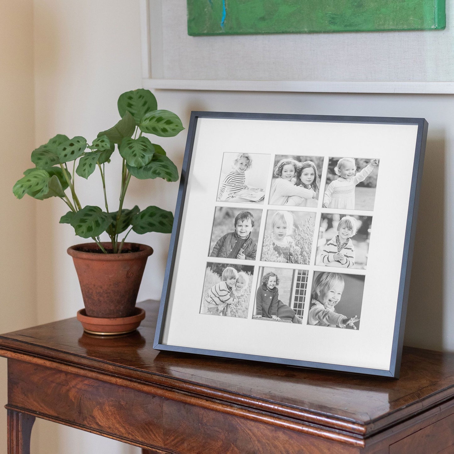 Nine Aperture Black Wall Hanging Frame